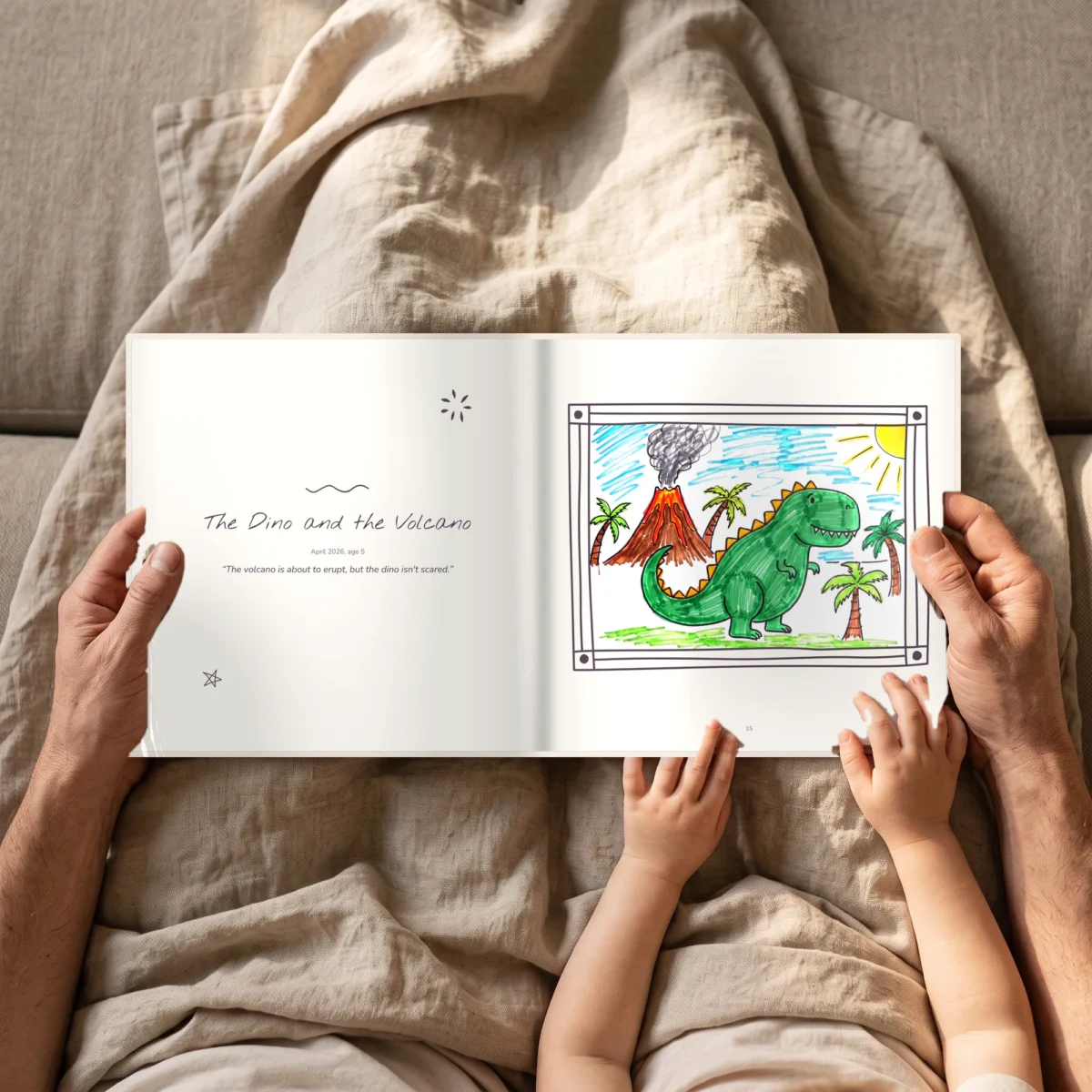 Open kids art book in beige on the sofa, held by an adult and a child